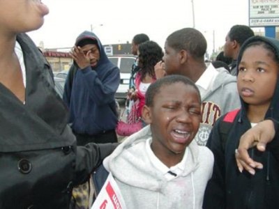 DPS 4th grader cries after being maced by DPS police during protest against the closing of Northern High School May 5, 2007.
