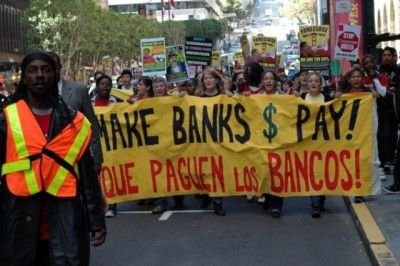 Occupy Oakland marches in California against the banks.