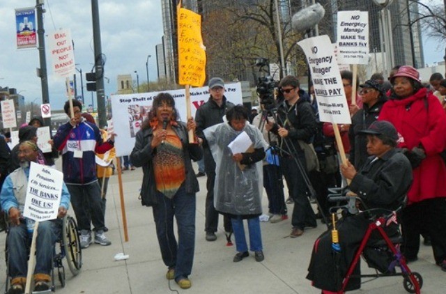 Gwen Mingo speaks against takeover of entire city of Detroit during bankruptcy proceedings, at protest May 1, 2014.