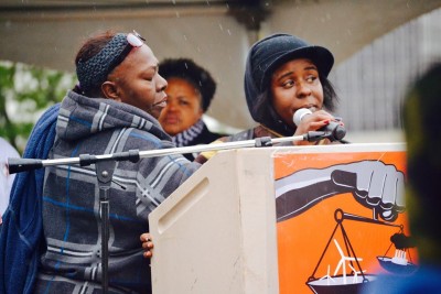Kimberly Griffin (r)speaks about her son's death at the Detroit March for Justice as Mertilla Jones (l) and Monica Lewis-Patrick (center) listen. Photo: Detroit People's Platform