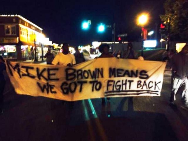 Protesters march outside Ferguson police station Sept. 25, 2014.
