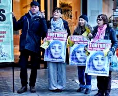 Palestinian women protest U.S.-Israeli genocide including torture of women, children.