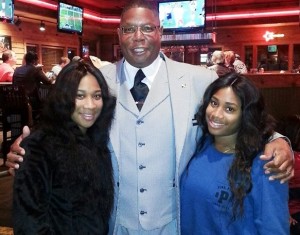 Pastor Kevin Clark, with twin daughters, sisters to Anthony Clark reed.