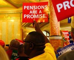 Workers rally to protect pensions.