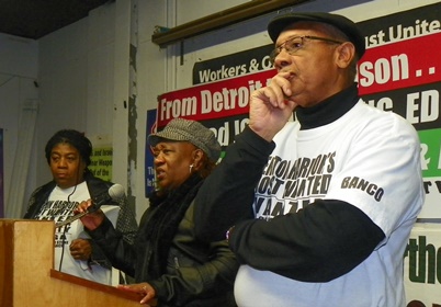 Rev. Edward Pinkney listens as his wife Dorothy Pinkney thanks a crowd in Detroit for their support of her husband Nov. 17.  She told VOD she will not waver in her love and support for him as well.
