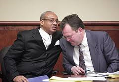 Rev. Pinkney confers with appeals attorney Tim Holloway at earlier court hearing. Photo: Daymon Hartley
