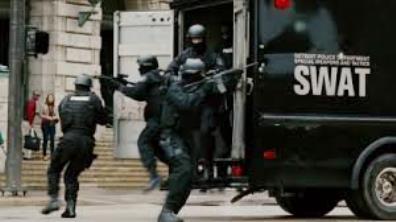 Police SWAT team invades home.