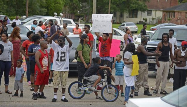 People pour into the streets to protest Sterling's death July 5. Photo: The Advocate