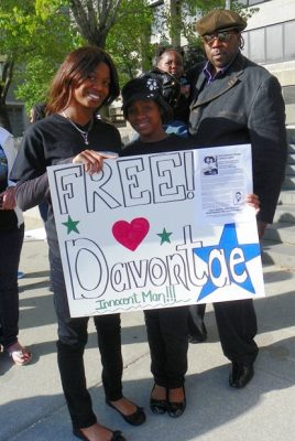 Jermaine Tilmon with his stepdaughters during rally April 23, 2012.