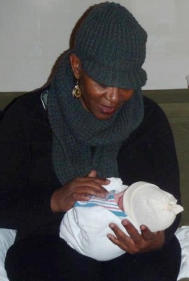 Shahidah Muta with new grandbaby. What future is there for the children of Detroit?