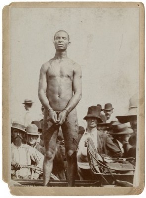Photo of slave auction attended by southern "gentlemen."