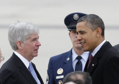 Pres. Obama greeted by Mich. Gov. Rick Snyder on his arrival in Flint.