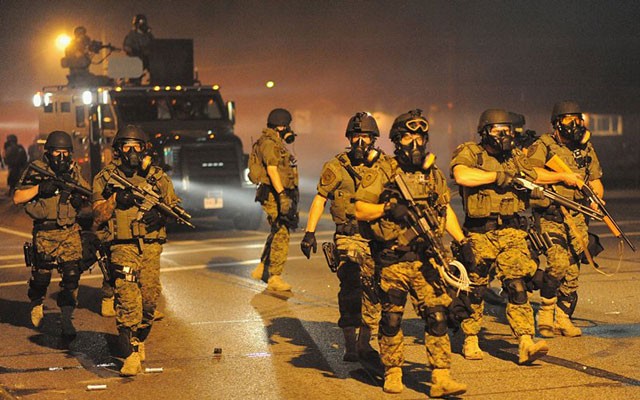 St. Louis County police advance on protesters of Michael Brown