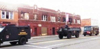 Police swat tanks roll down Linwood to kidnap Ariana from her mother in their home June 24, 2011.