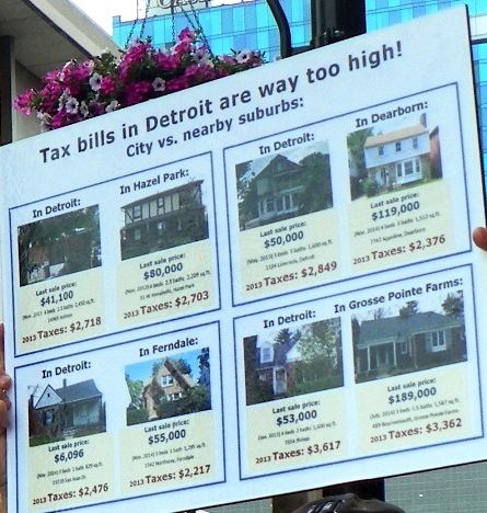 Tax bills in Detroit way too high; poster compares home values and taxes in Detroit and suburbs.