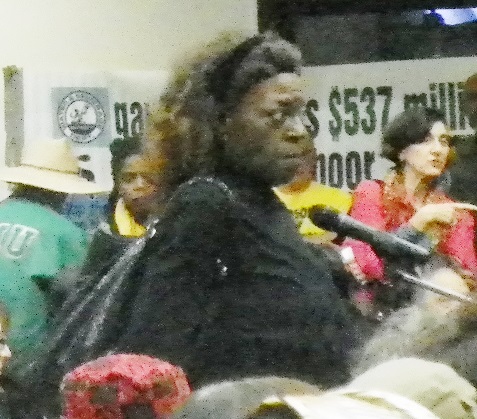 Detroit woman testifies angrily about her experiences with DWSD.