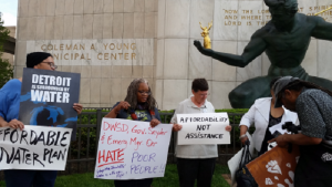 Protesters outside Coleman A. Young Municipal Center May 18 demand a water affordability plan.