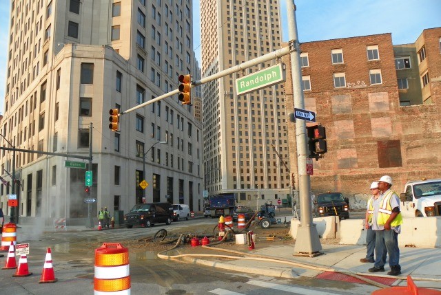Water main break under Detroit Water Board Building had streets, parking lot for customers flooded for weeks this month.
