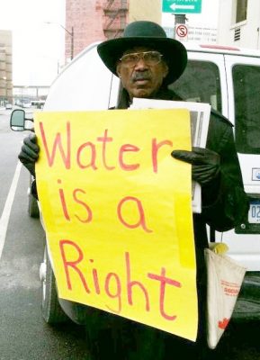 The late Tashi Kiya at protest against water shut-offs in Detroit.